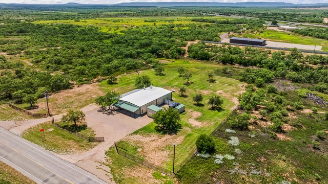 a view of a yard with a lake