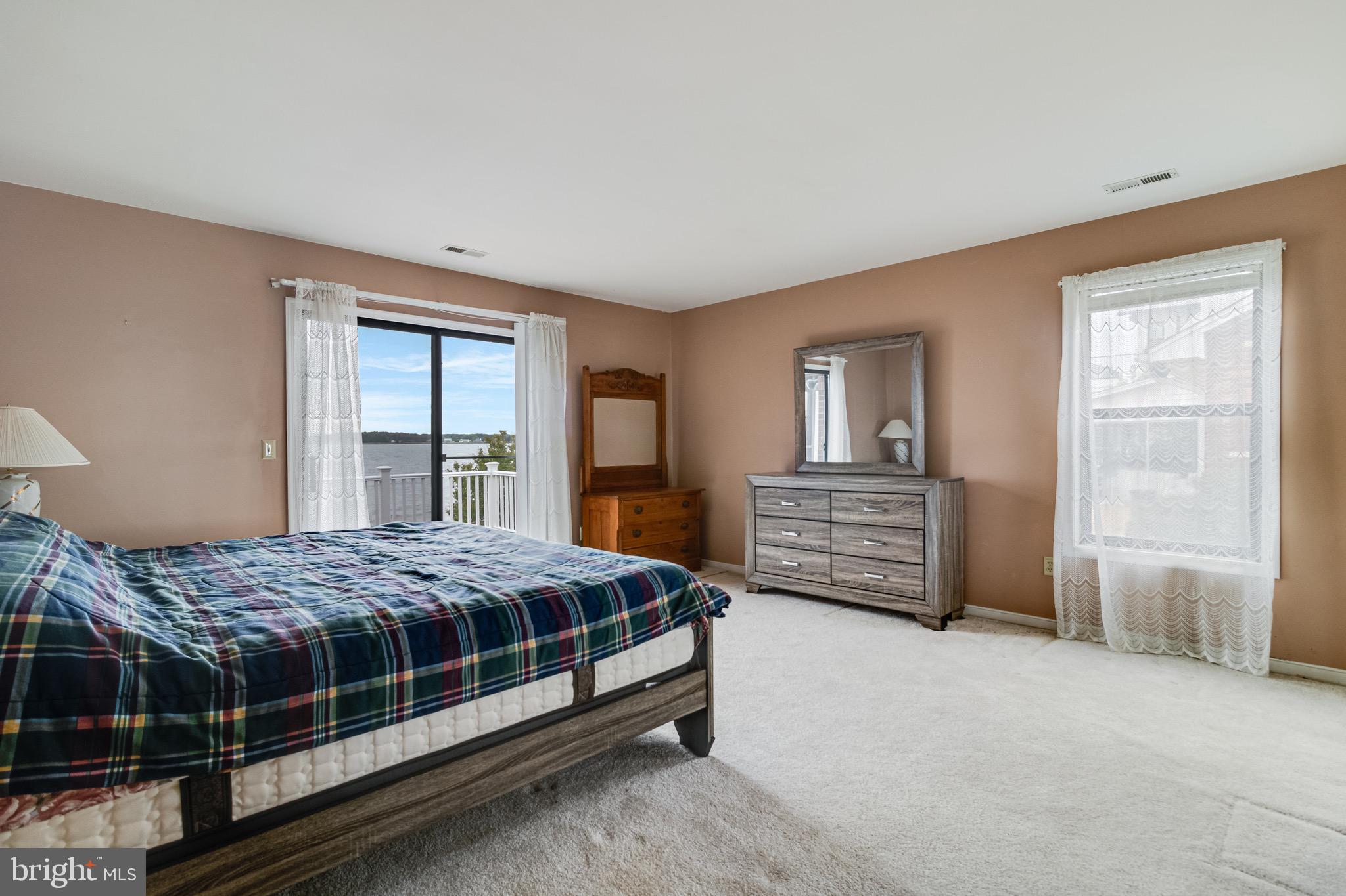 899 North Glebe Road Montross, VA 22520 - Photo 11 of 57 a bedroom with a bed and a window