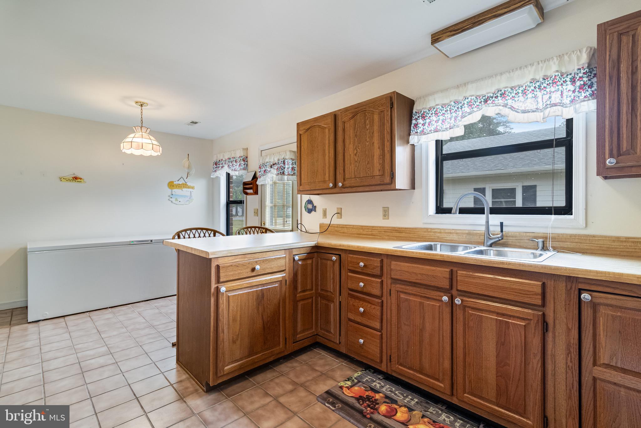 899 North Glebe Road Montross, VA 22520 - Photo 30 of 57 a kitchen with a sink cabinets and appliances