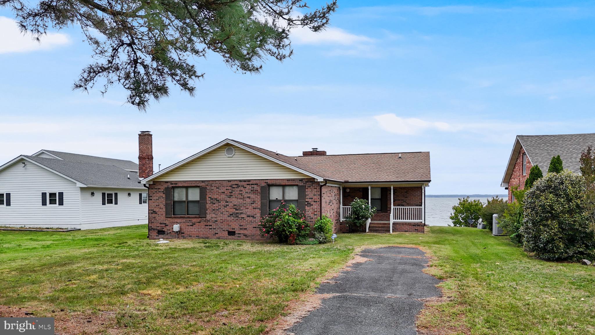 899 North Glebe Road Montross, VA 22520 - Photo 3 of 57 a front view of a house with a garden