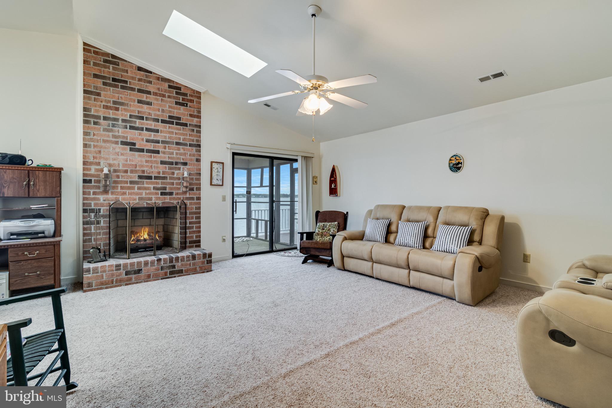 899 North Glebe Road Montross, VA 22520 - Photo 32 of 57 a living room with furniture and a fireplace