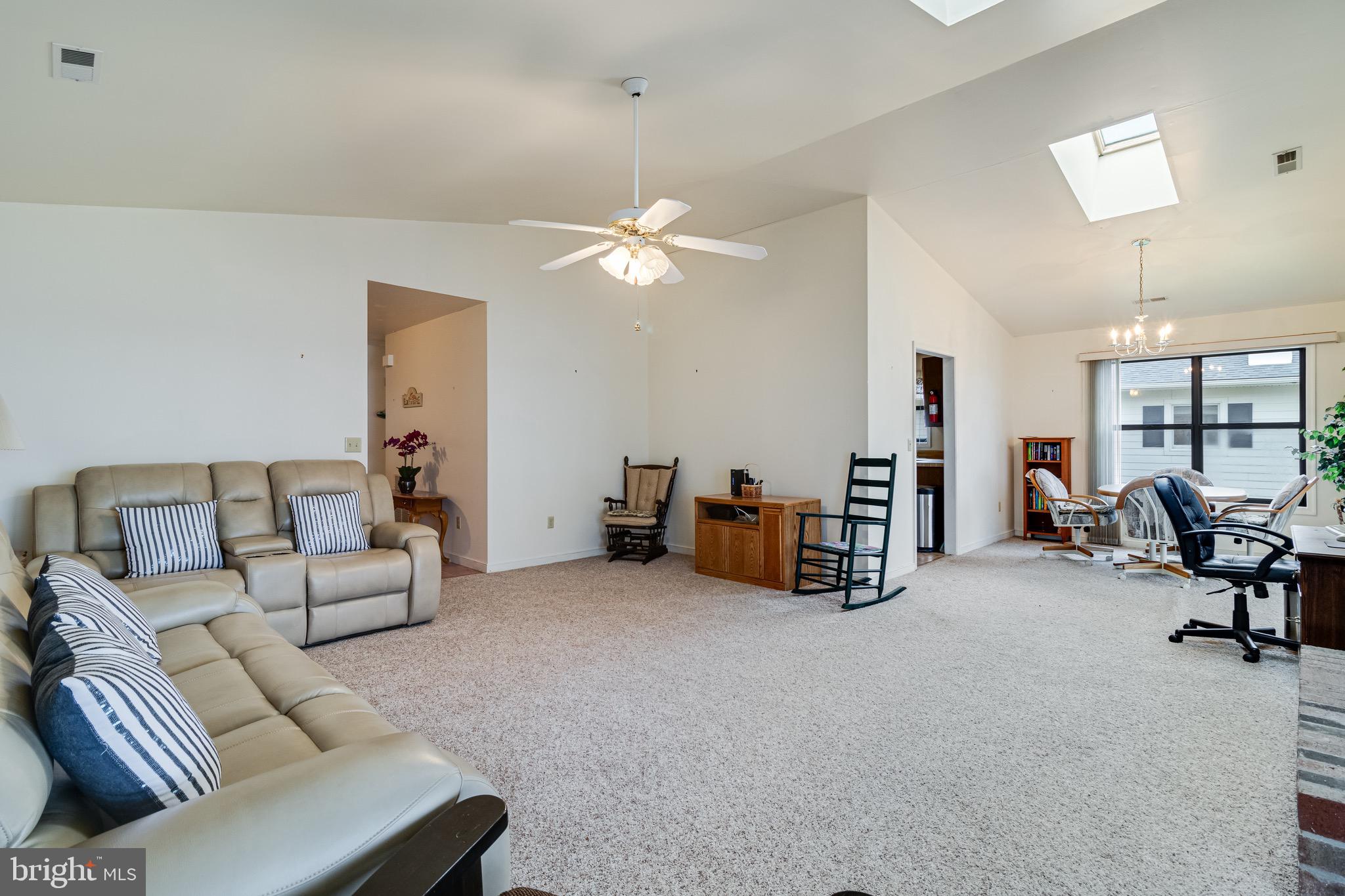 899 North Glebe Road Montross, VA 22520 - Photo 33 of 57 a living room with furniture and a chandelier