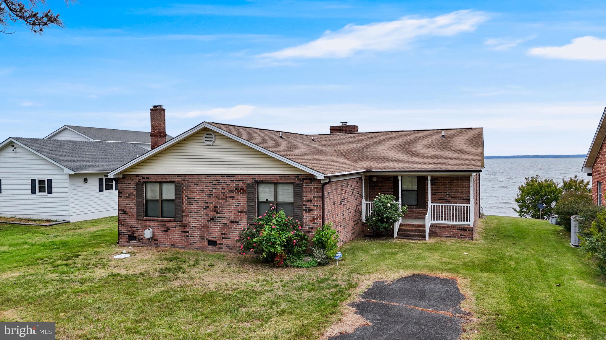 899 North Glebe Road Montross, VA 22520 - Photo 5 of 57 a view of a house with a yard and potted plants