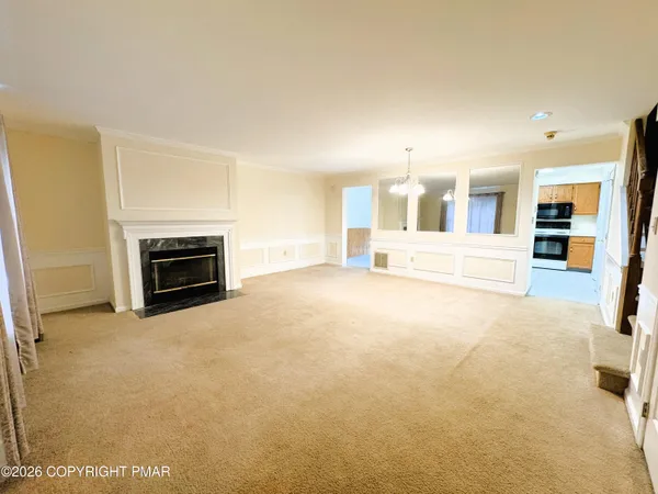 a view of a livingroom with a fireplace