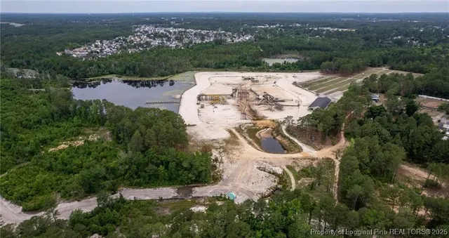 an aerial view of a house with a garden