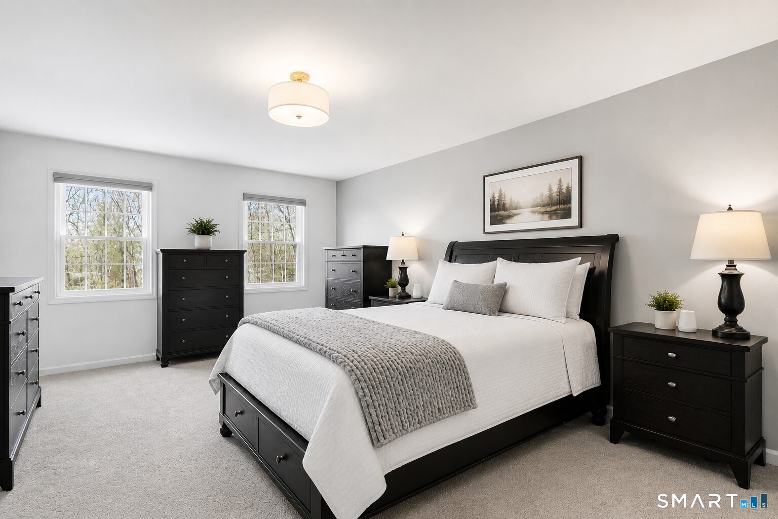 45 Beardsley Road New Milford, CT 06776 - Photo 19 of 40 The spacious primary suite serves as a true retreat, featuring a large walk-in closet