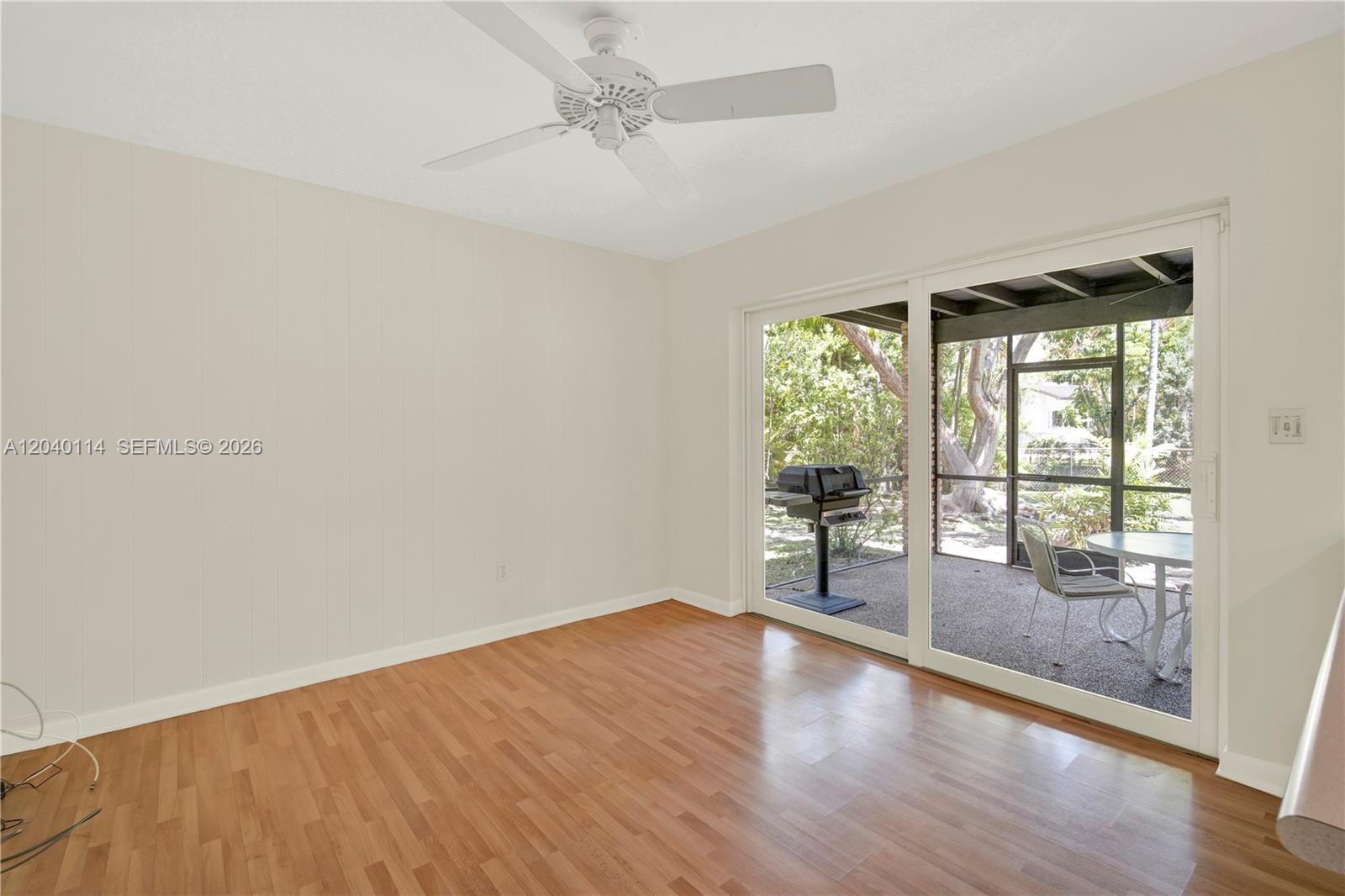 10435 Southwest 96th Street Miami, FL 33176 - Photo 16 of 44 Family room with patio access