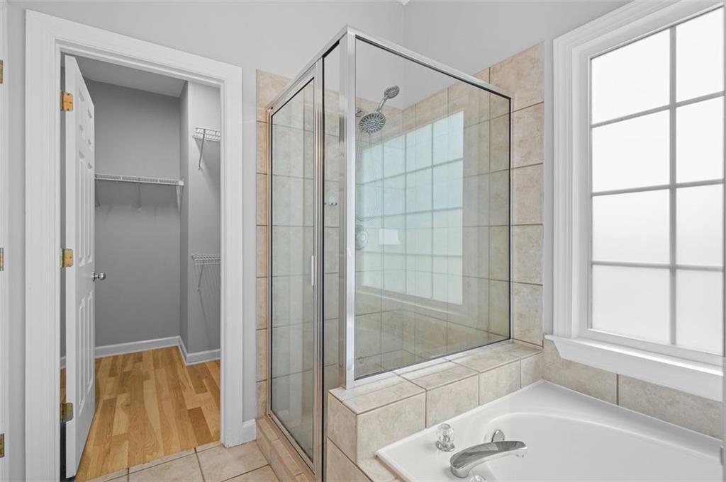 2313 Manor Avenue Atlanta, GA 30344 - Photo 24 of 31 a bathroom with a shower and a bathtub