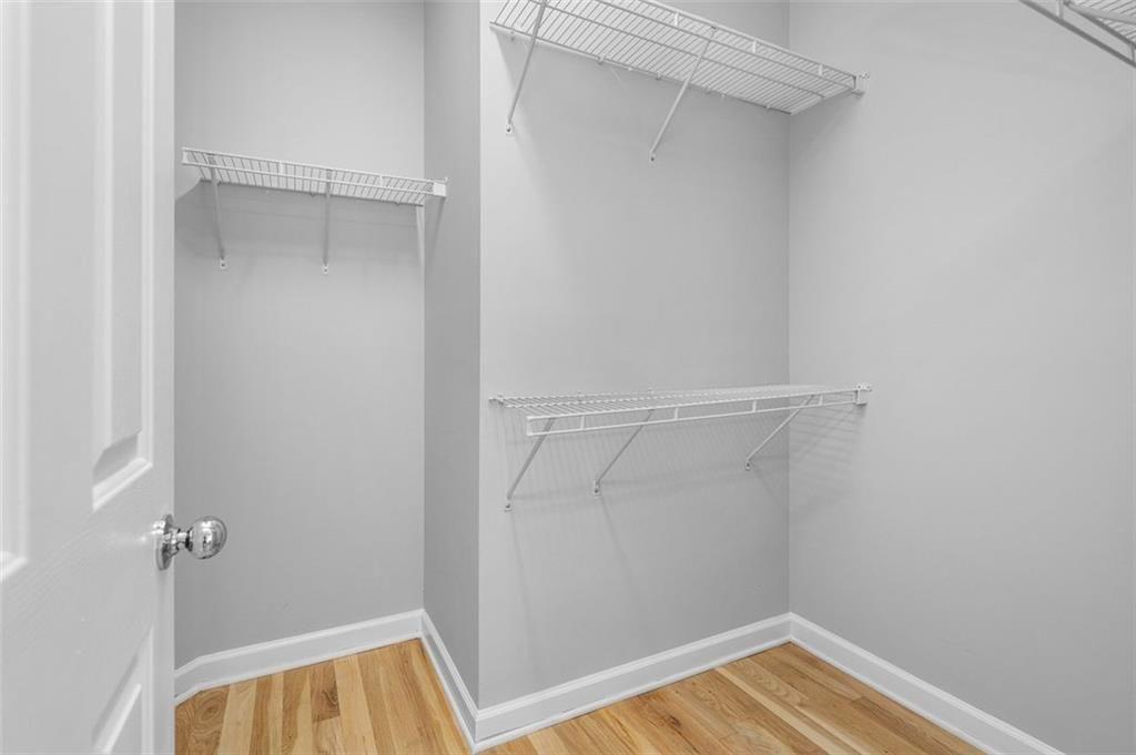 2313 Manor Avenue Atlanta, GA 30344 - Photo 25 of 31 a view of walk in closet with empty racks