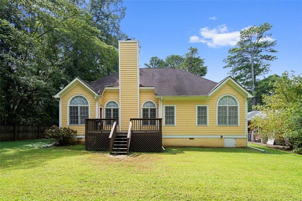 2313 Manor Avenue Atlanta, GA 30344 - Photo 30 of 31 a front view of a house with a yard