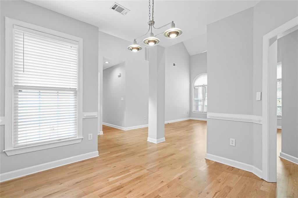 2313 Manor Avenue Atlanta, GA 30344 - Photo 6 of 31 a view of a room with wooden floor and window