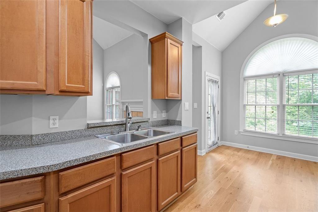 2313 Manor Avenue Atlanta, GA 30344 - Photo 9 of 31 a kitchen with a sink and cabinets