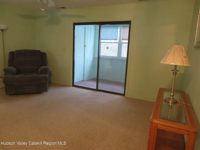 a room with furniture and a gate