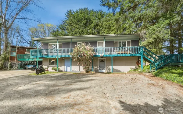 a front view of a house with a patio