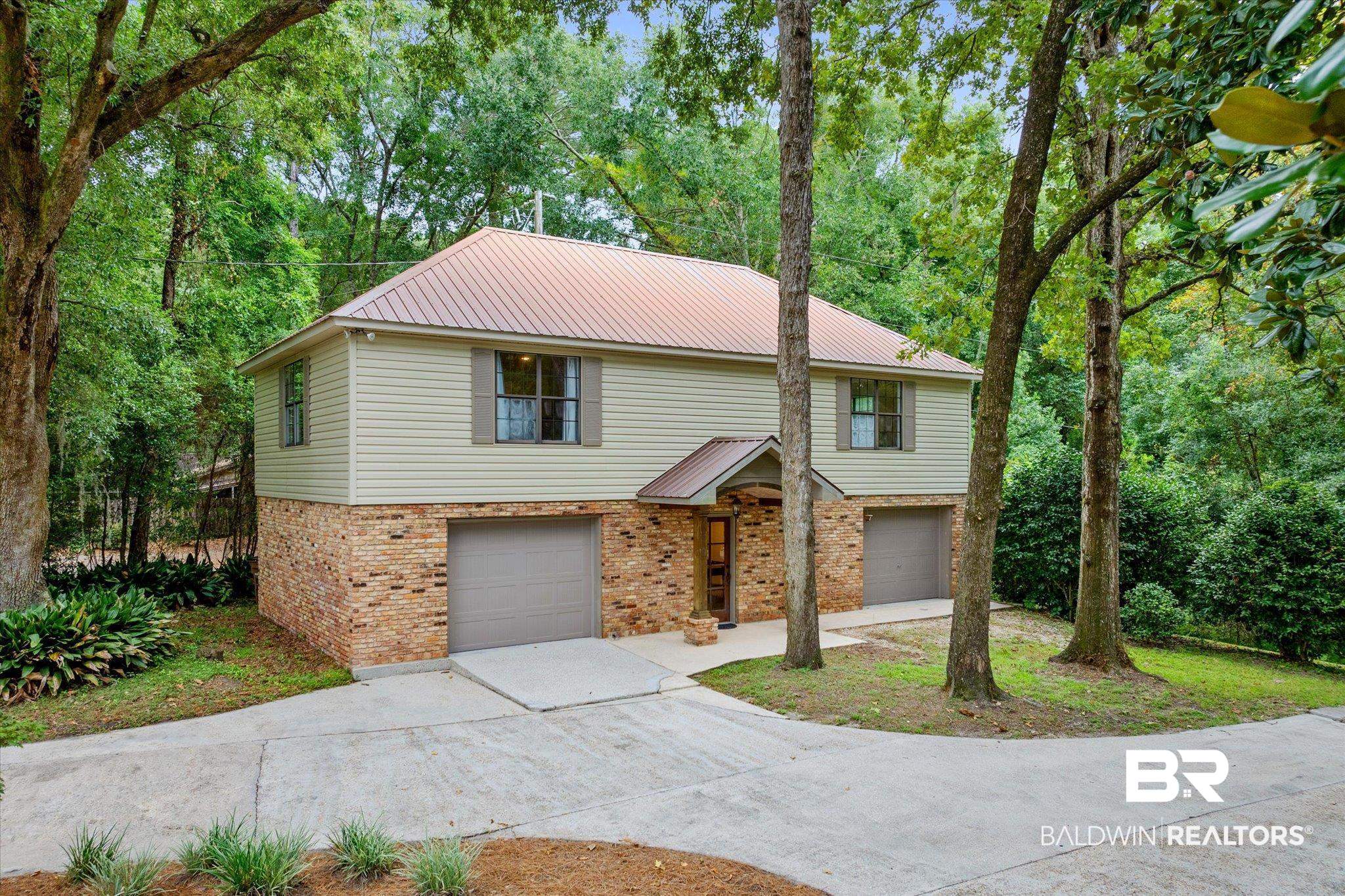 2228 Riverside Drive Mobile, AL 36605 - Photo 36 of 51 View of front of home with a garage