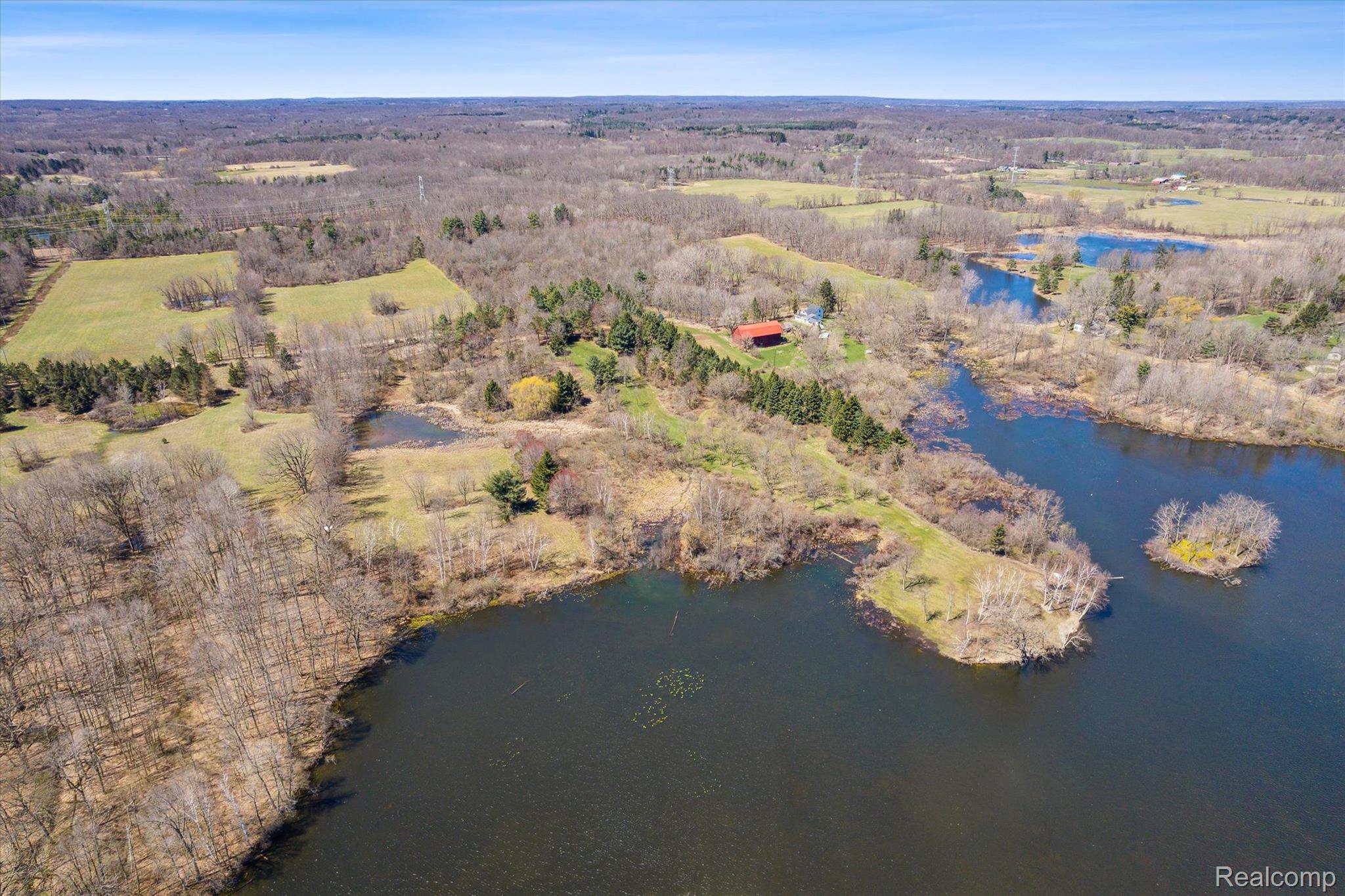 5380 Hagerman Road Leonard, MI 48367 - Photo 32 of 38 Lake living with privacy