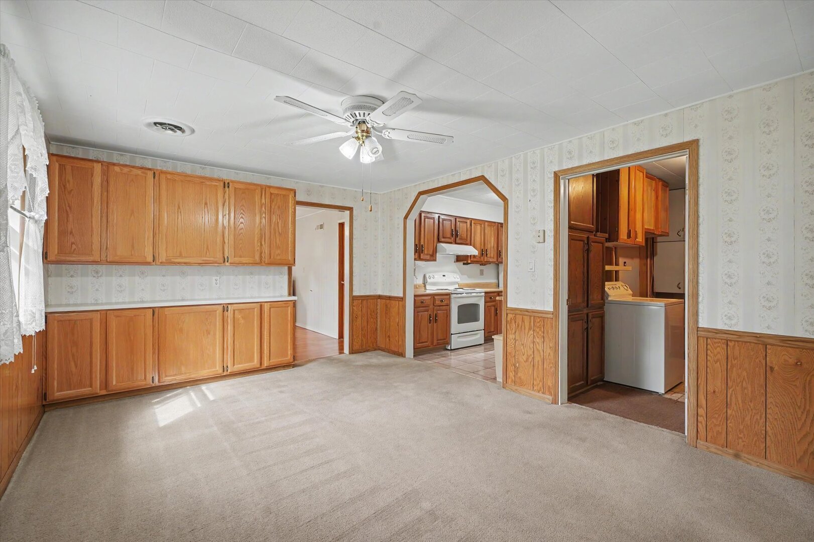 517 Illinois Drive Rantoul, IL 61866 - Photo 17 of 37 a view of a kitchen with refrigerator and cabinet