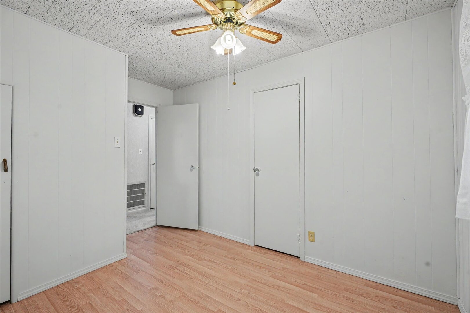 517 Illinois Drive Rantoul, IL 61866 - Photo 19 of 37 a view of an empty room with wooden floor