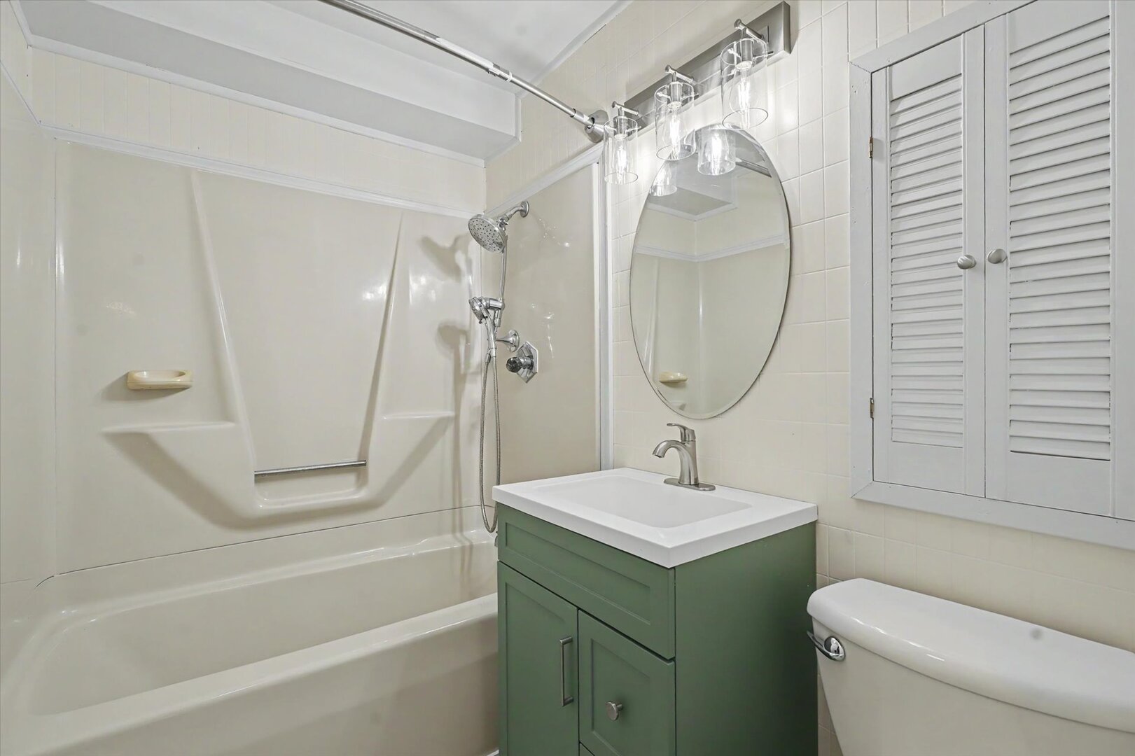 517 Illinois Drive Rantoul, IL 61866 - Photo 20 of 37 a bathroom with a sink toilet and shower