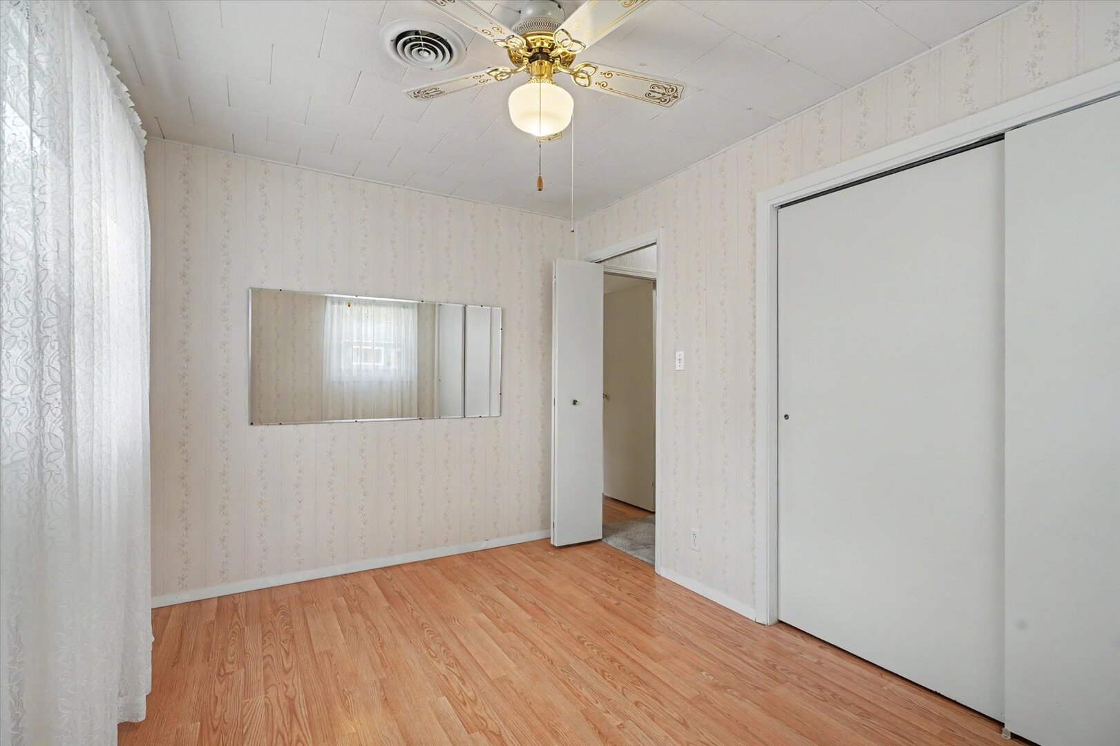 517 Illinois Drive Rantoul, IL 61866 - Photo 22 of 37 a view of an empty room with a window