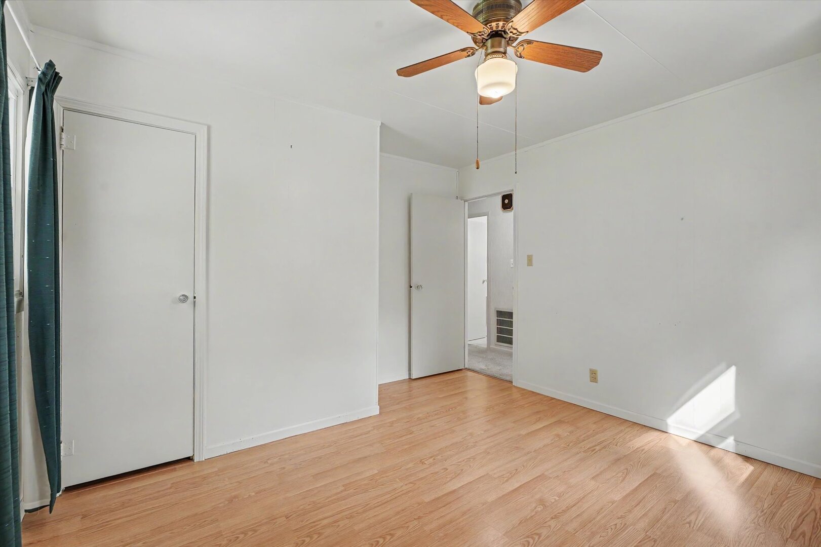 517 Illinois Drive Rantoul, IL 61866 - Photo 24 of 37 a view of empty room with ceiling fan and window