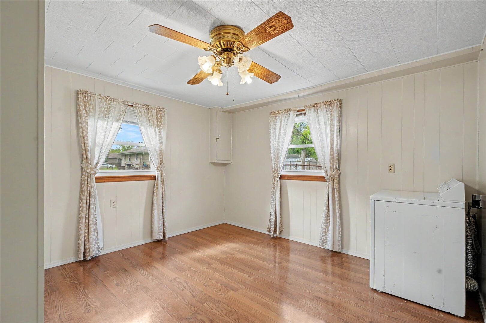 517 Illinois Drive Rantoul, IL 61866 - Photo 25 of 37 wooden floor in an empty room with a window
