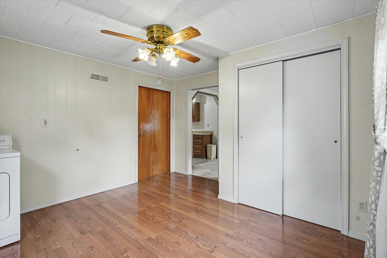 517 Illinois Drive Rantoul, IL 61866 - Photo 26 of 37 a view of an empty room with wooden floor