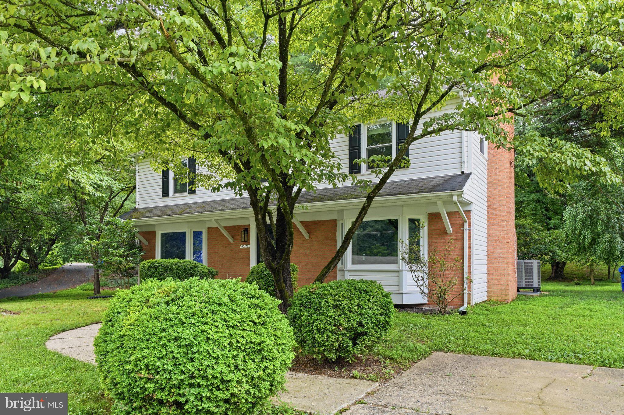 13120 Clifton Road Silver Spring, MD 20904 - Photo 45 of 69 a front view of a house with garden