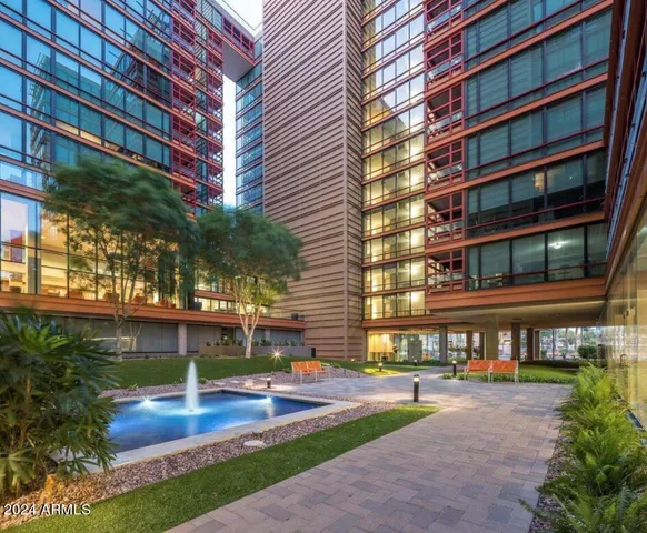 a view of swimming pool with outdoor seating