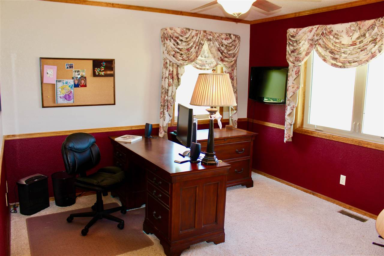 53716 Falcon Road Olathe, CO 81425 - Photo 6 of 39 a view of a workspace with furniture