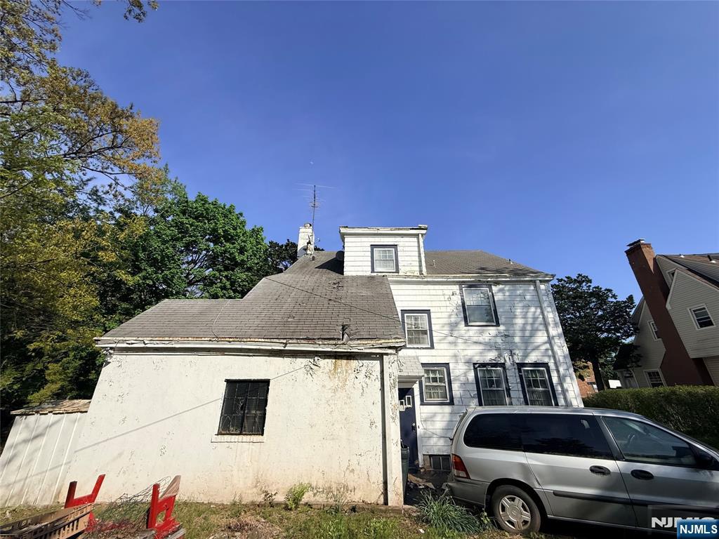 599 South Center Street Orange, NJ 07050 - Photo 19 of 19 a car parked in front of a house