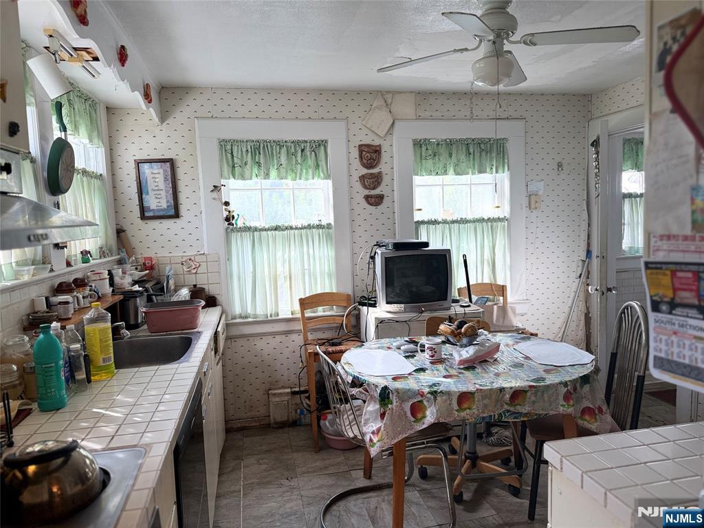 599 South Center Street Orange, NJ 07050 - Photo 5 of 19 a view of a dining room with furniture