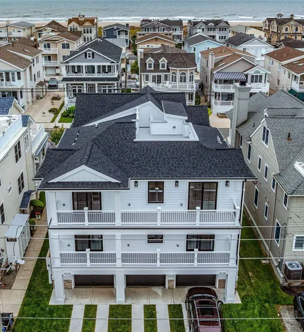 a front view of a building with glass windows