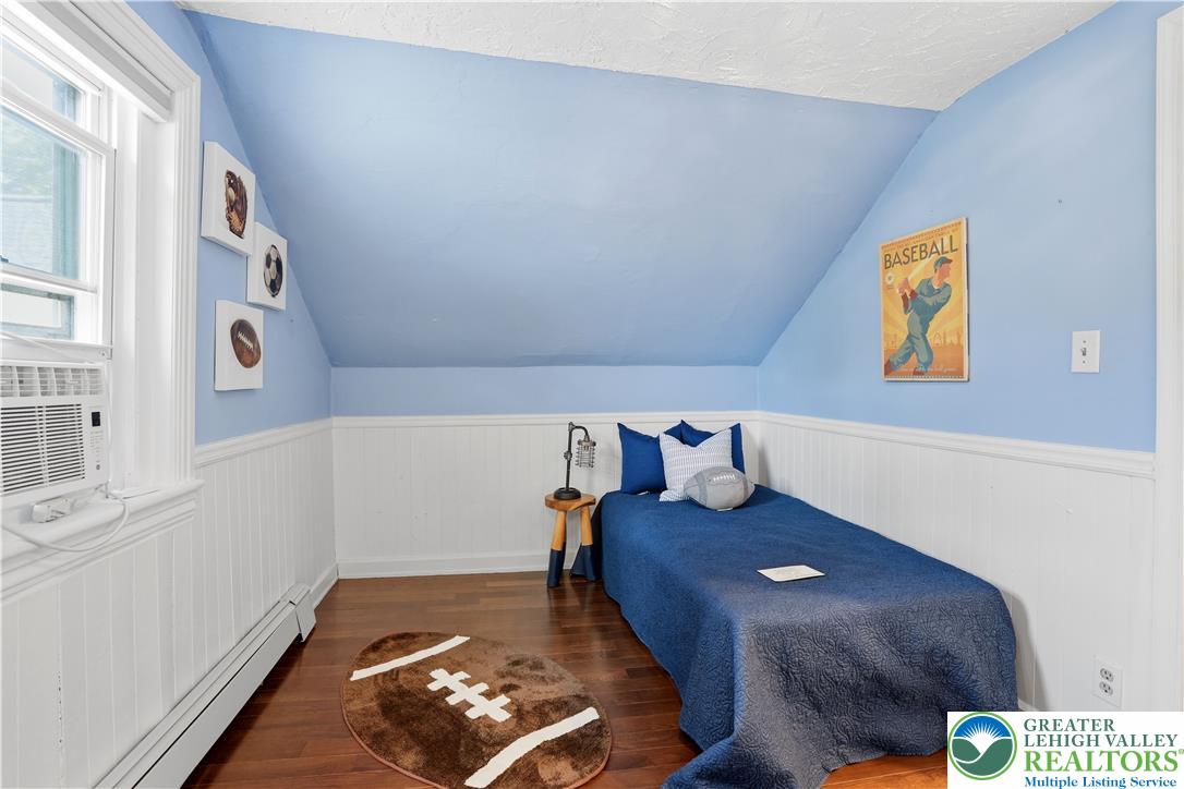 2014 Linden Street Bethlehem, PA 18017 - Photo 44 of 85 Hardwood floors and crisp wainscoting define this charming bedroom, perfect for restful nights.