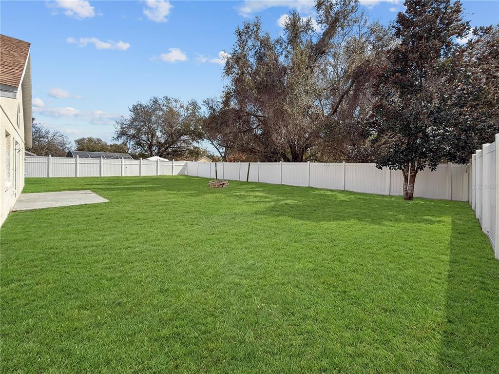 11748 Constance Way Clermont, FL 34711 - Photo 11 of 45 a view of field with tall trees