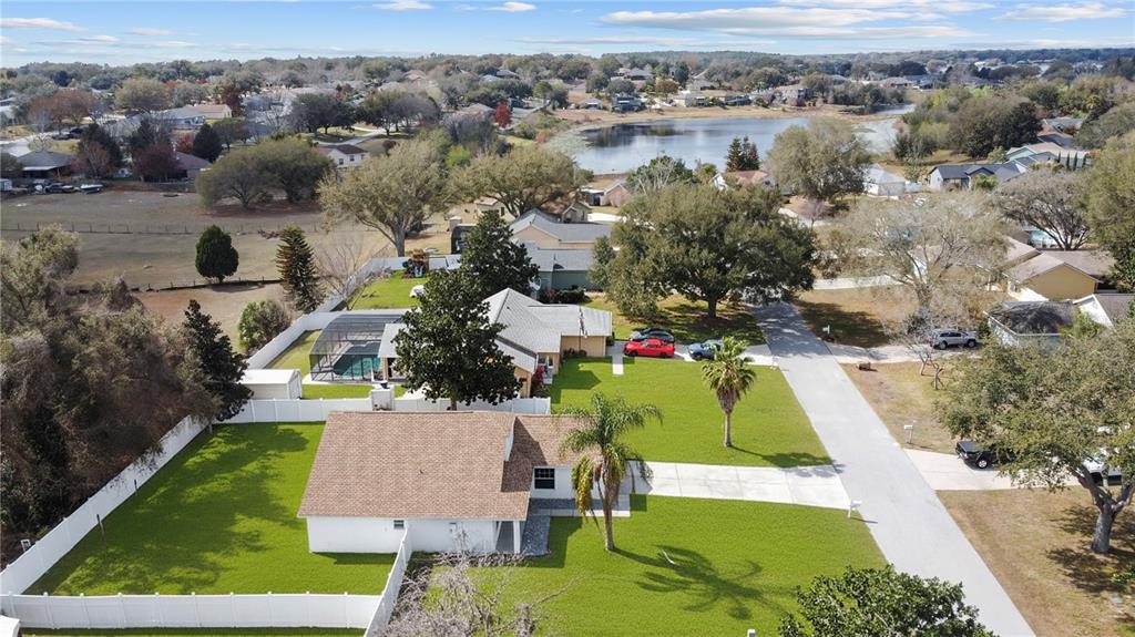 11748 Constance Way Clermont, FL 34711 - Photo 2 of 45 an aerial view of a house with a swimming pool