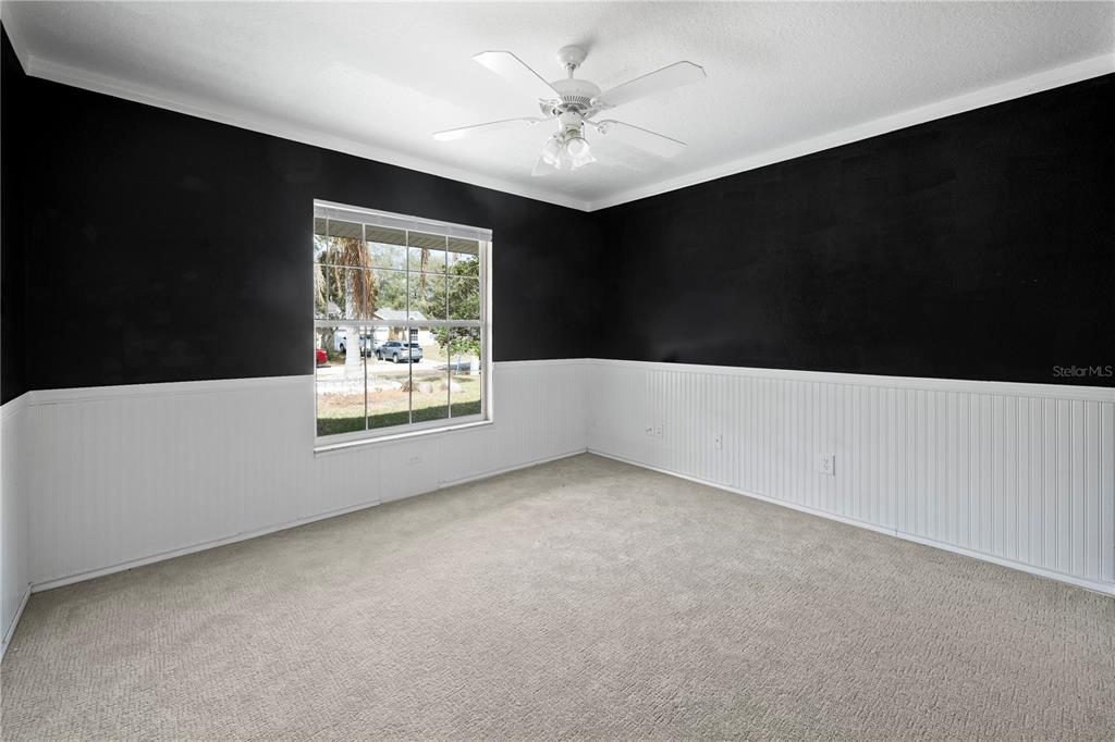 11748 Constance Way Clermont, FL 34711 - Photo 22 of 45 a living room with a window