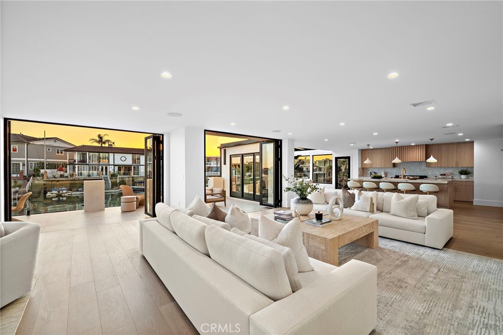 16471 Barnstable Circle Huntington Beach, CA 92649 - Photo 9 of 57 a living room with furniture and a large window