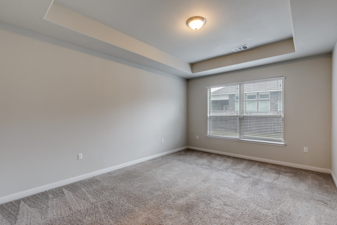 14904 Cabrillo Way Austin, TX 78738 - Photo 14 of 20 an empty room with a window