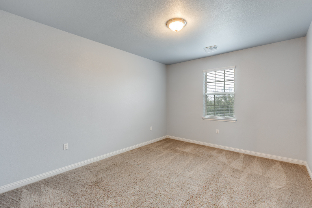 14904 Cabrillo Way Austin, TX 78738 - Photo 18 of 20 an empty room with a window