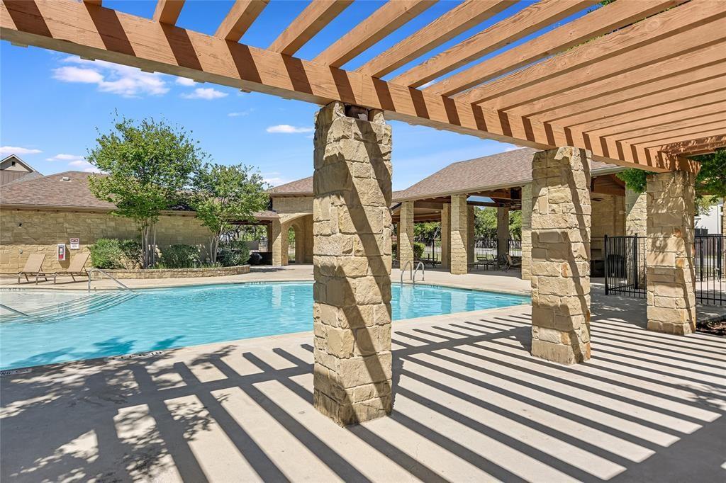14904 Cabrillo Way Austin, TX 78738 - Photo 20 of 20 a front view of a house with a yard