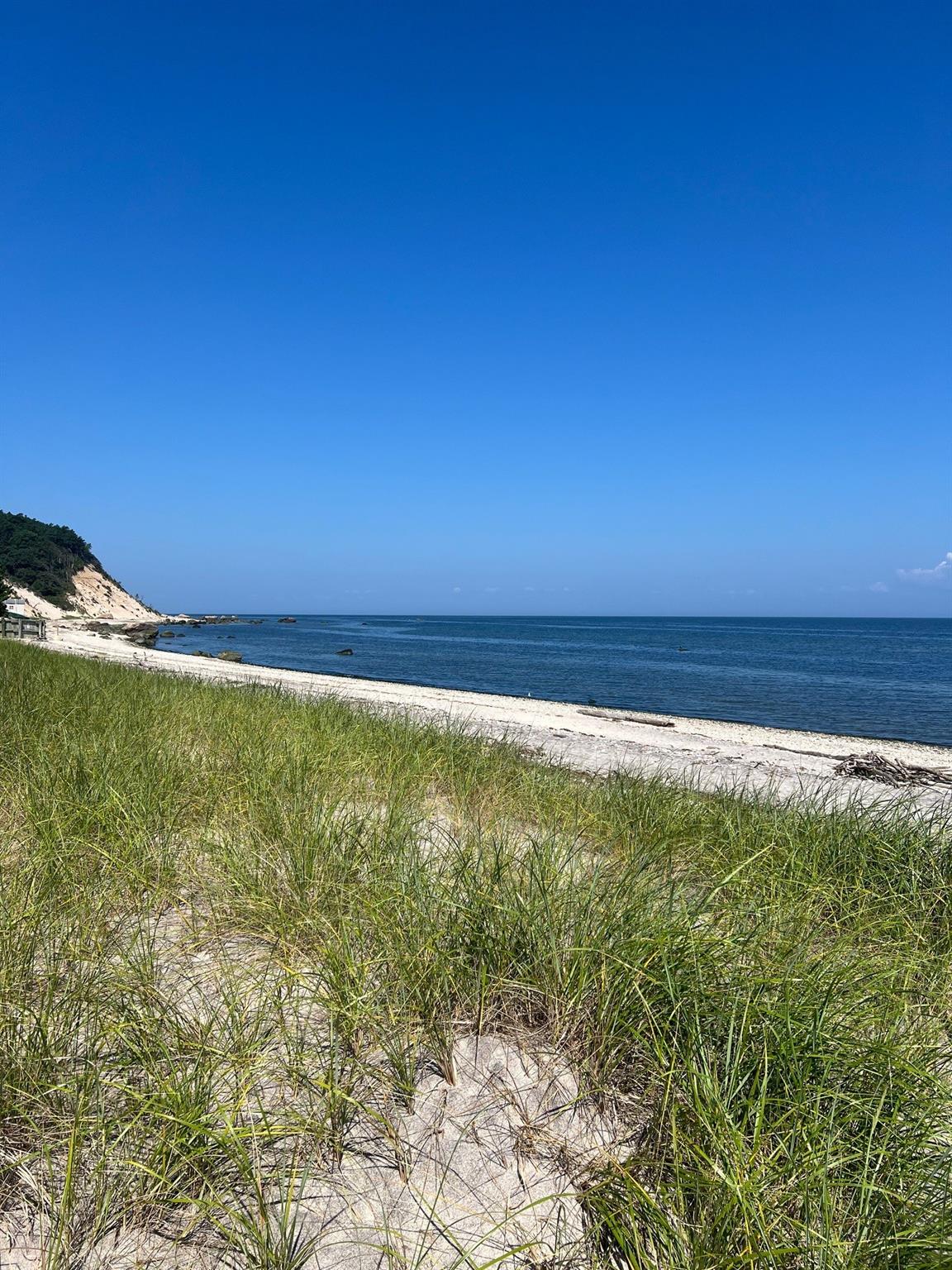 Fern Road Calverton, NY 11933 - Photo 10 of 13 a view of an ocean from a yard