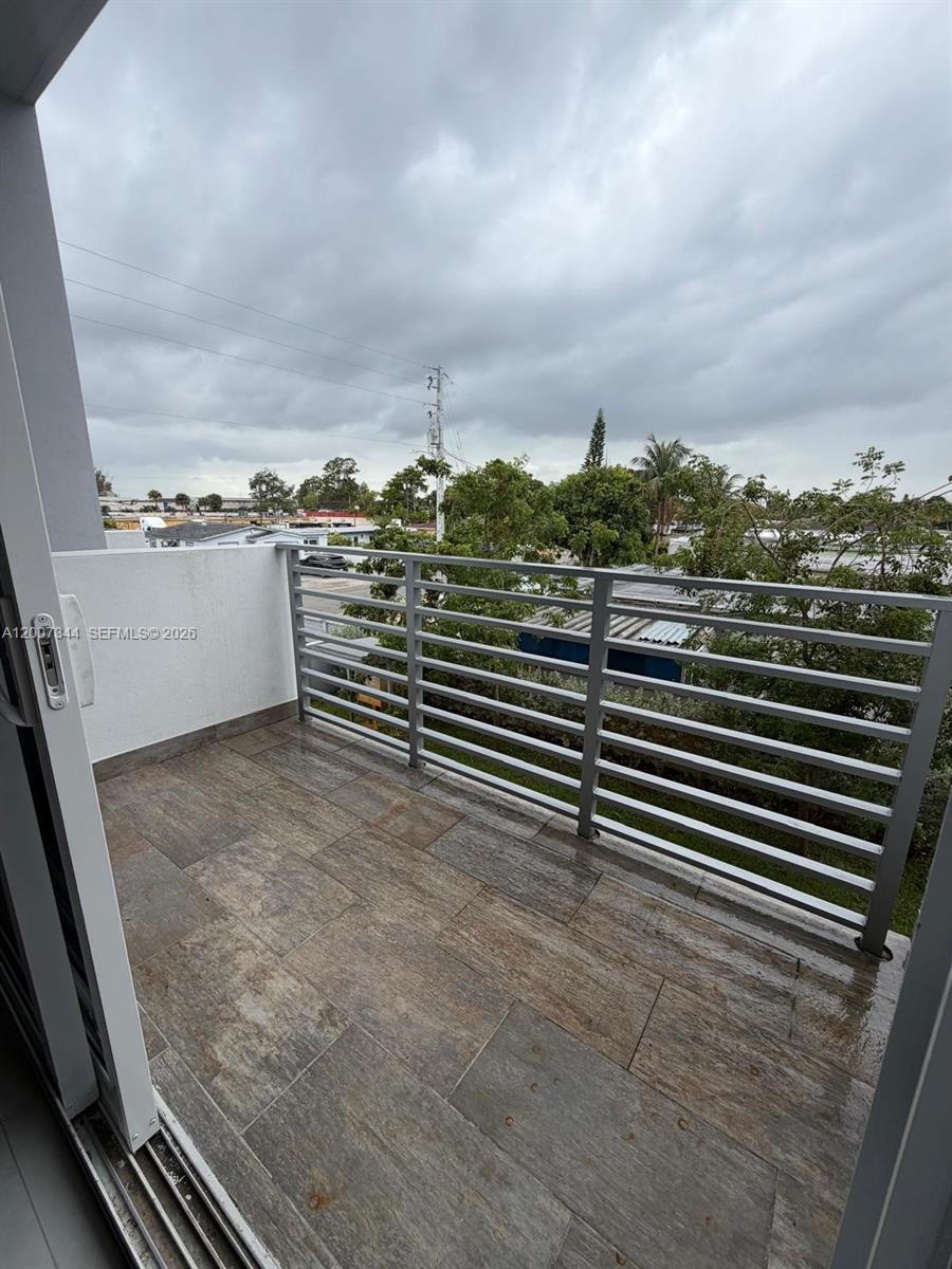381 East 50th Street, Unit 6 Hialeah, FL 33013 - Photo 12 of 37 a view of a terrace