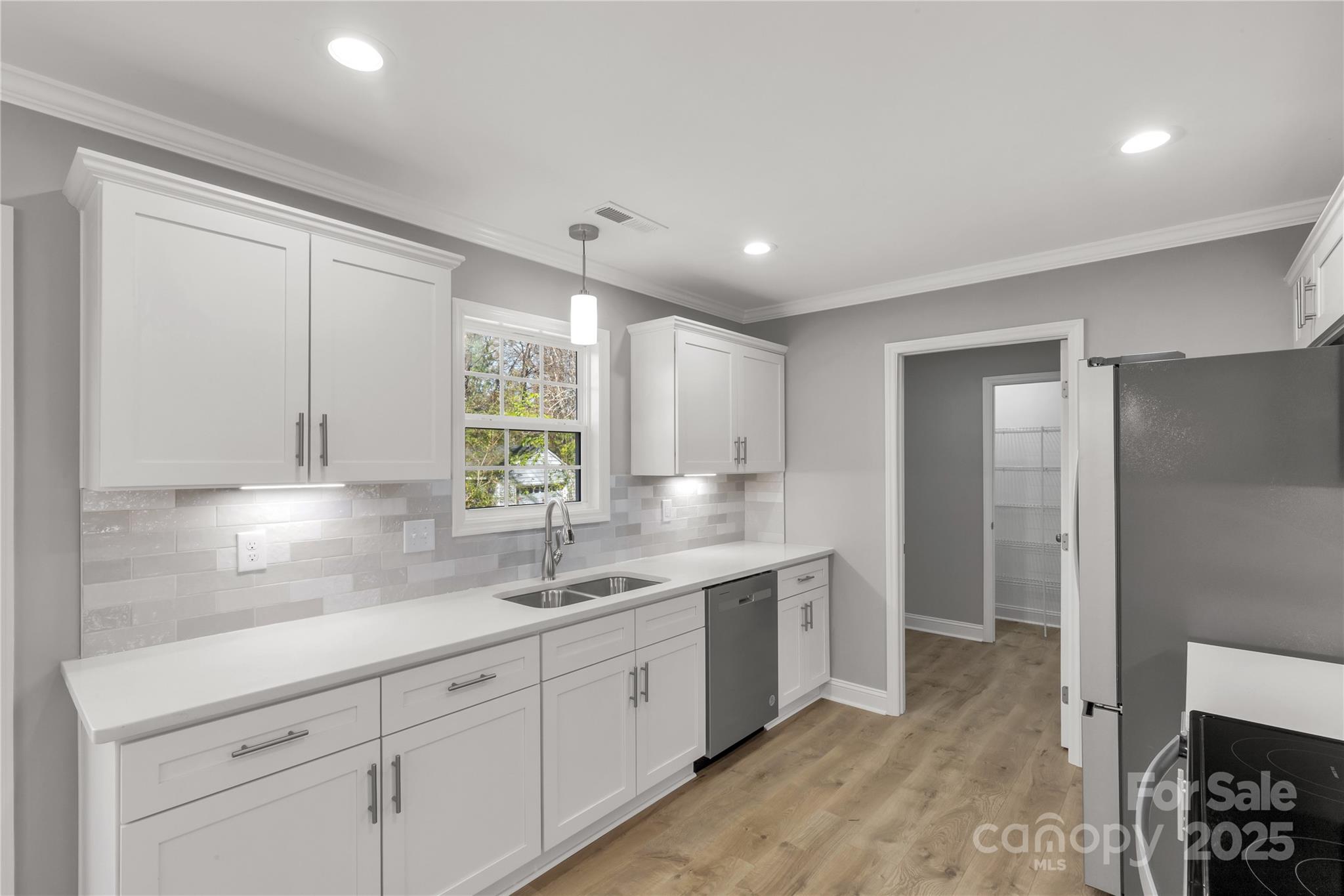 2166 Reeves Road Lancaster, SC 29720 - Photo 13 of 32 a kitchen with a sink and cabinets