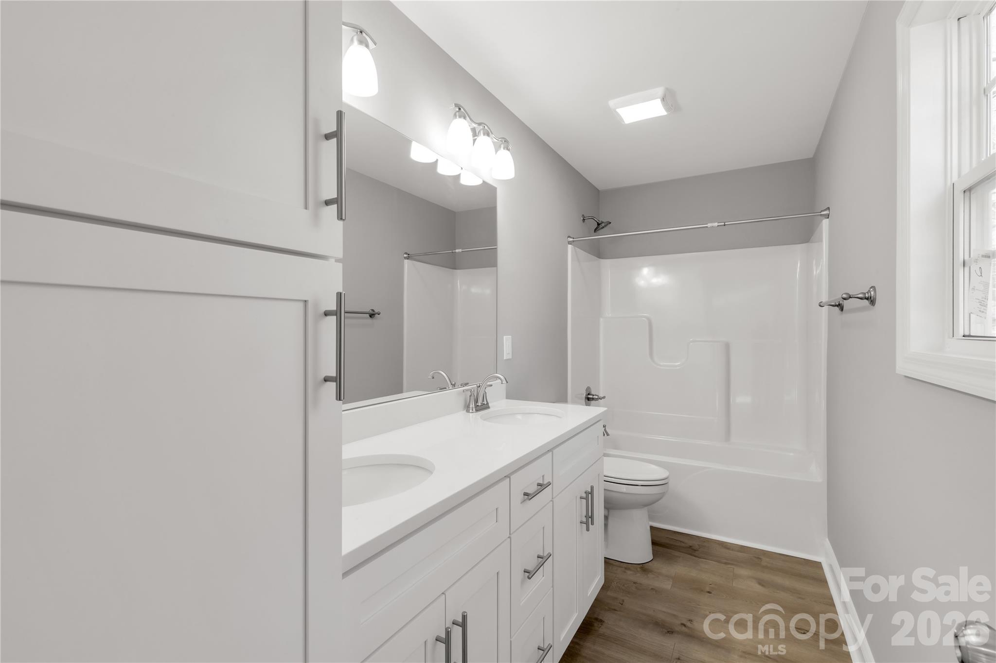 2166 Reeves Road Lancaster, SC 29720 - Photo 19 of 37 a bathroom with a sink a toilet and shower