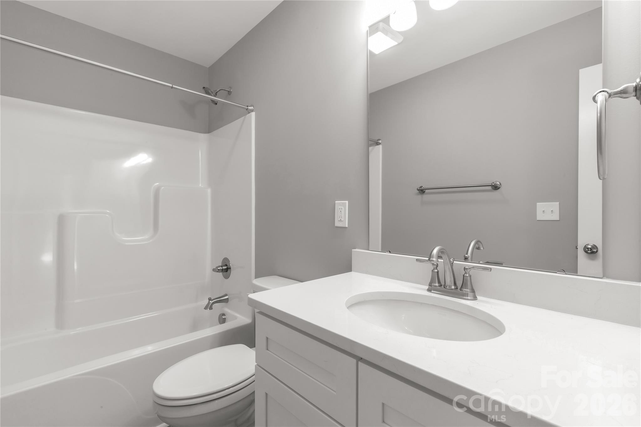 2166 Reeves Road Lancaster, SC 29720 - Photo 24 of 37 a bathroom with a granite countertop sink toilet and shower