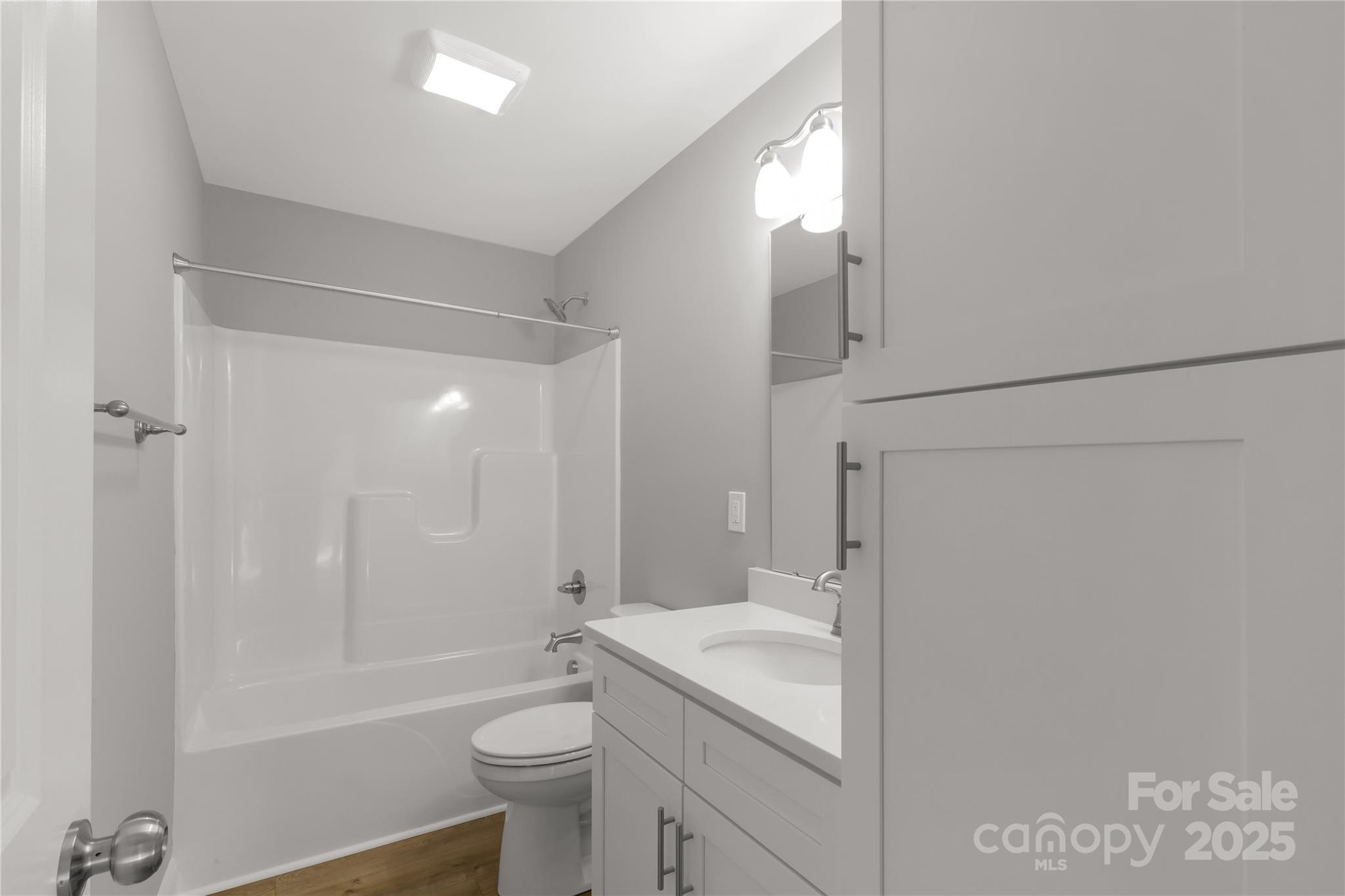 2166 Reeves Road Lancaster, SC 29720 - Photo 24 of 32 a bathroom with a granite countertop sink toilet and shower