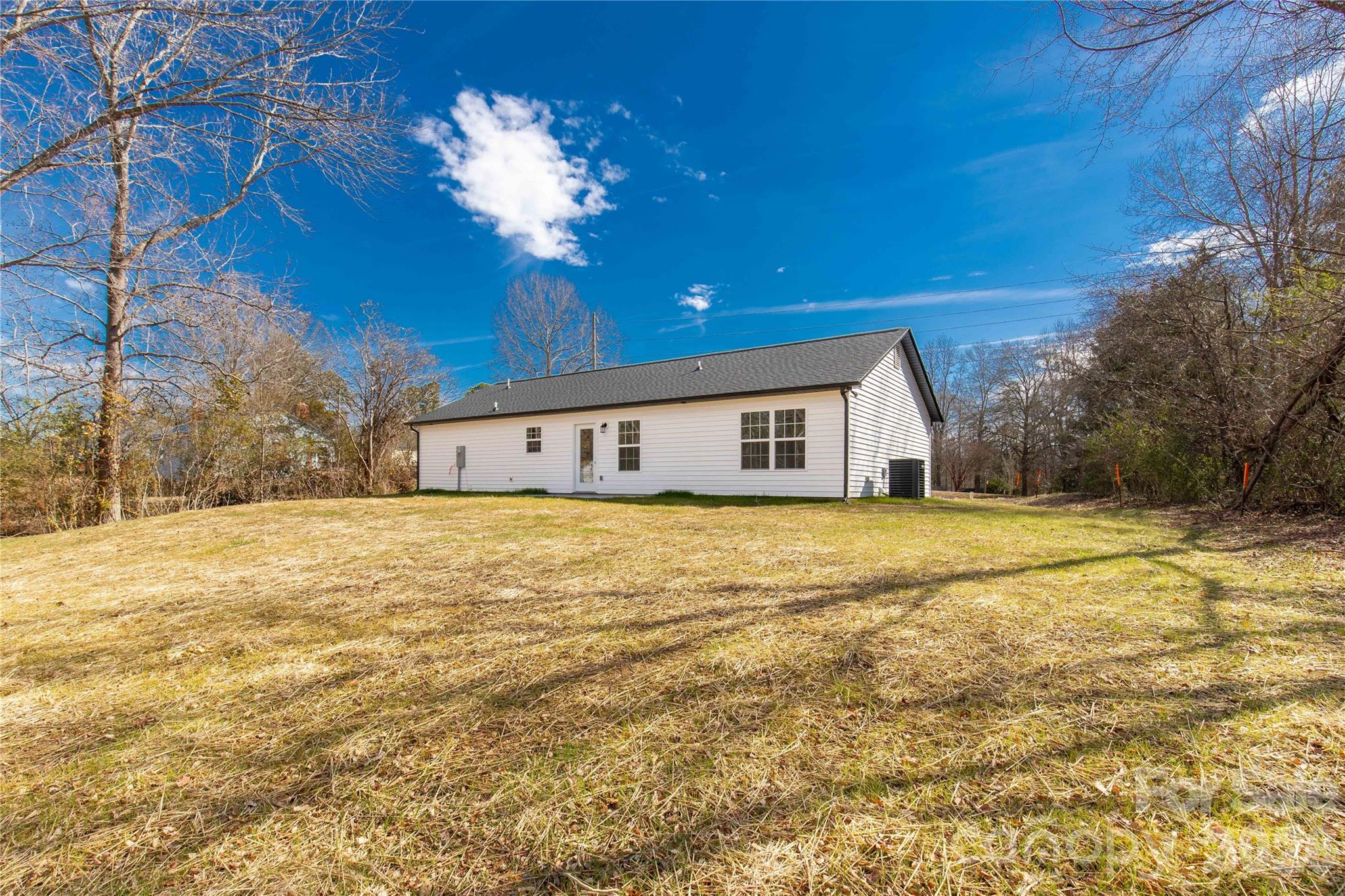 2166 Reeves Road Lancaster, SC 29720 - Photo 30 of 37 a big room with yellow house in front of it