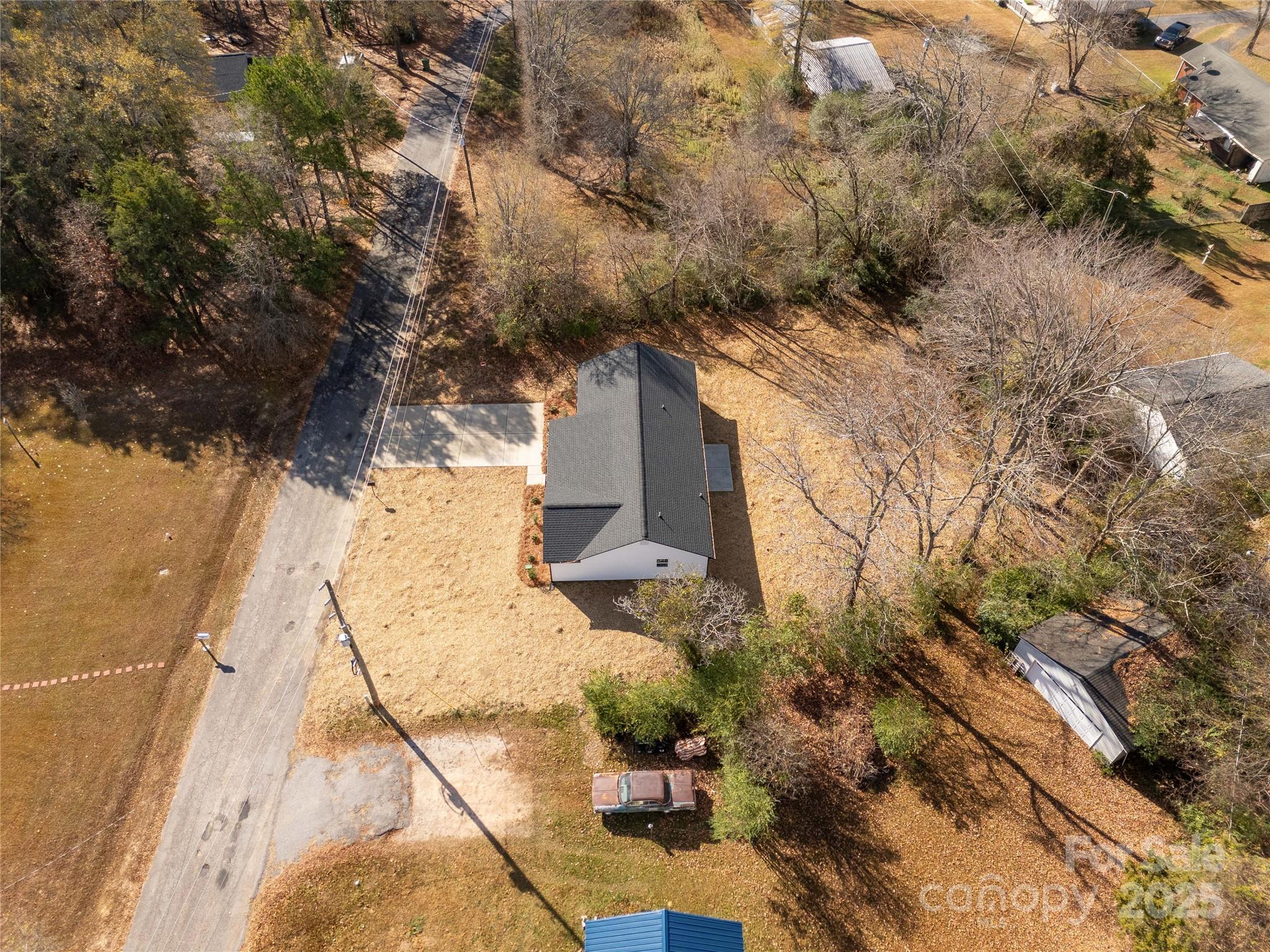 2166 Reeves Road Lancaster, SC 29720 - Photo 31 of 32 a view of a yard and mountain