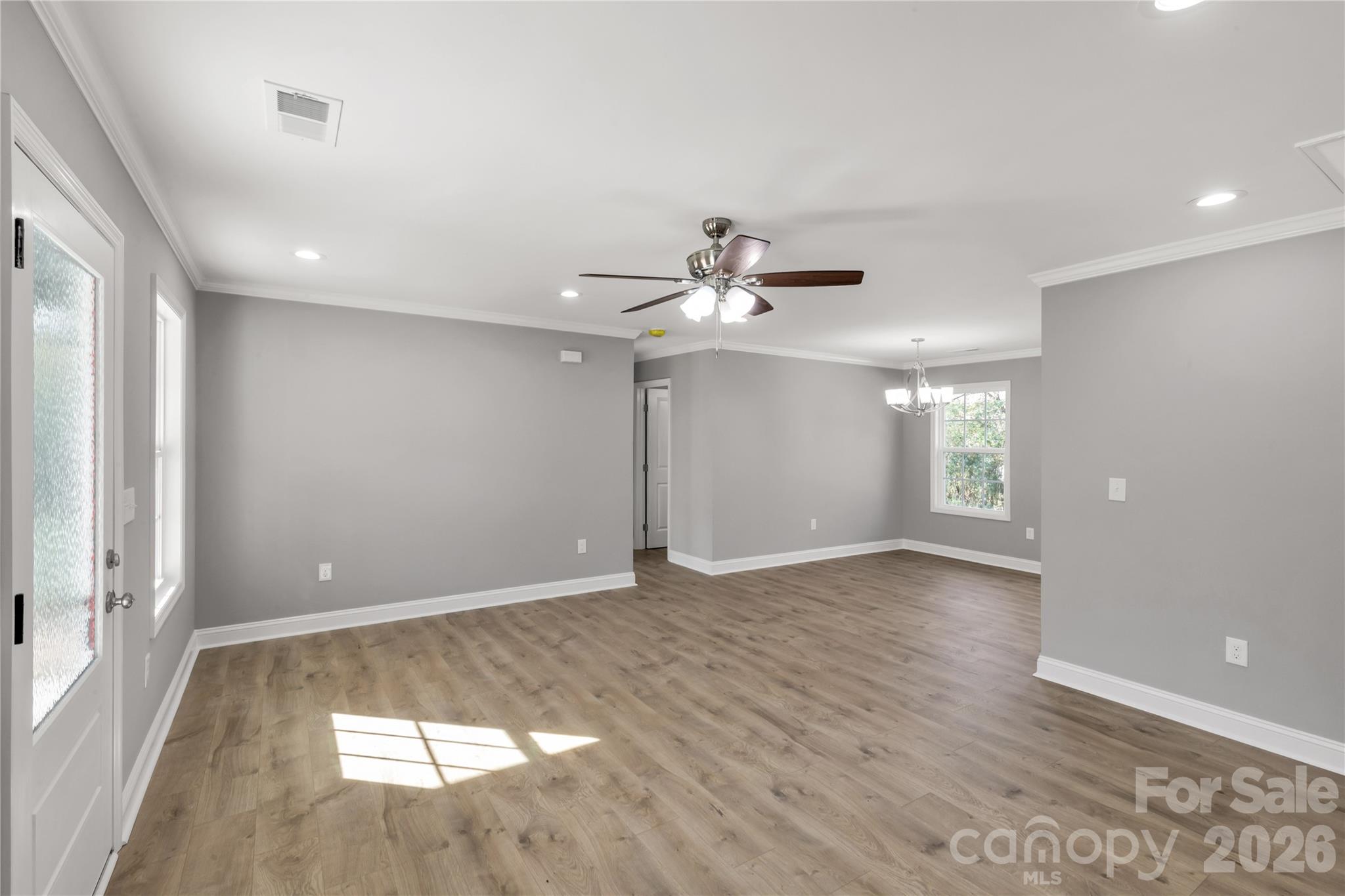 2166 Reeves Road Lancaster, SC 29720 - Photo 6 of 37 wooden floor in an empty room with a window